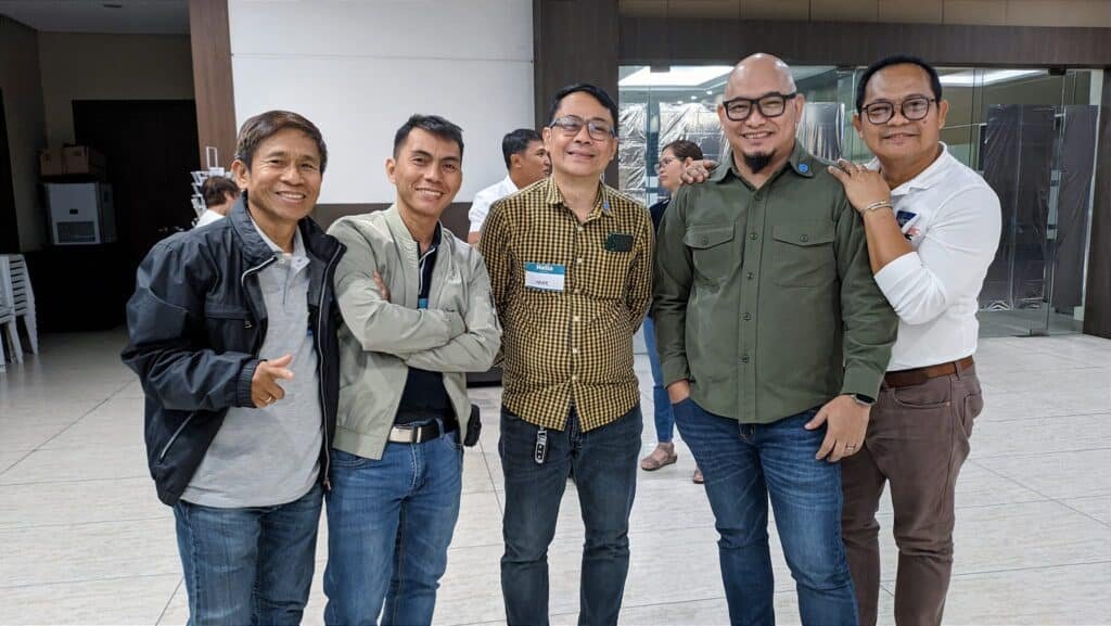T-Net Philippines National Gathering participants posing for a photo in a lobby.